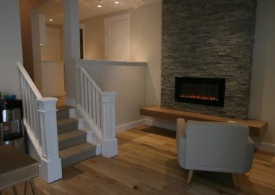 Carrs Landing fireplace with stone surround and hearth