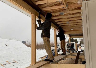 Farmhouse working on the exterior soffits