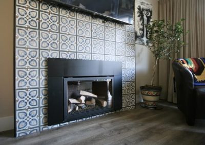 LoneWolf Homes Bay Ave fireplace with concrete tile surround