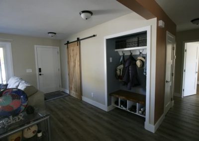 LoneWolf Homes Bay Ave front entrance and new closet with live edge shelf