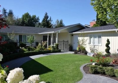 LoneWolf Homes Mission bungalow Hardie shake exterior with custom yellow colour