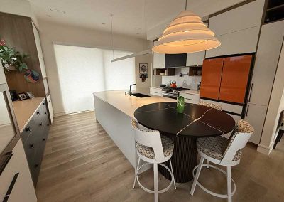 North end custom quartz island with contrast quartz inlayed for eat in kitchen area