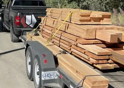 North End LoneWolf truck arriving with lumber for custom pergolas and soffit