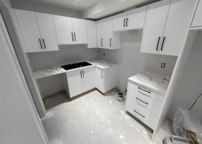 Tupman lower suite kitchen being built