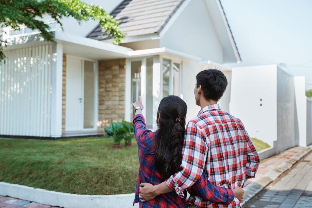mortgage with bad credit pointing at house